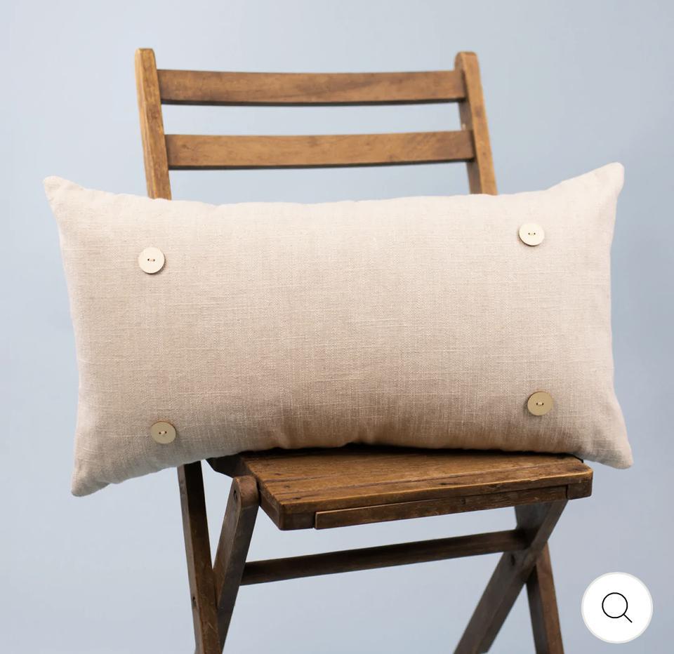 Swap button lumbar pillow